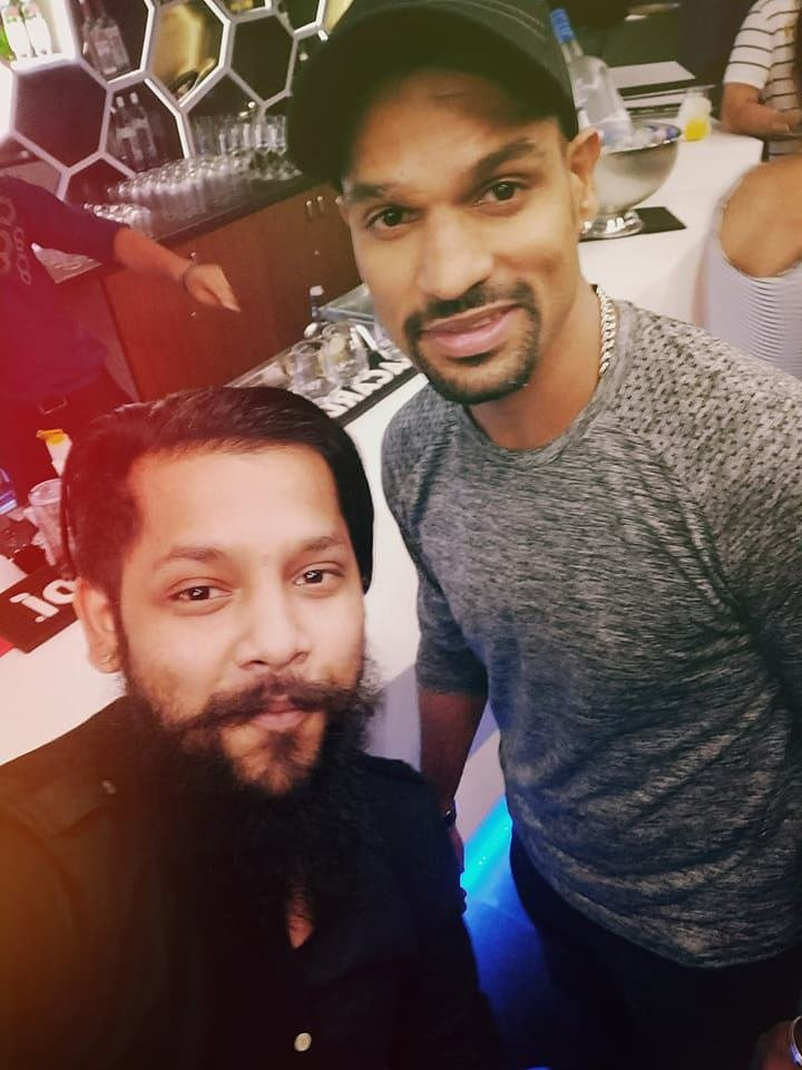 With Shikhar Dhawan at a team event