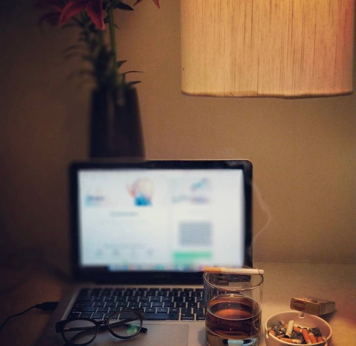 Designing late into the night on a laptop in the hotel room